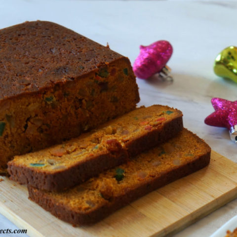 Slices of Indian Rum Cake on a Wooden Board