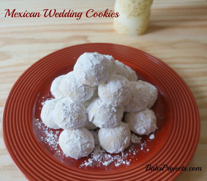 Mexican Wedding Cookies on a Red Plate