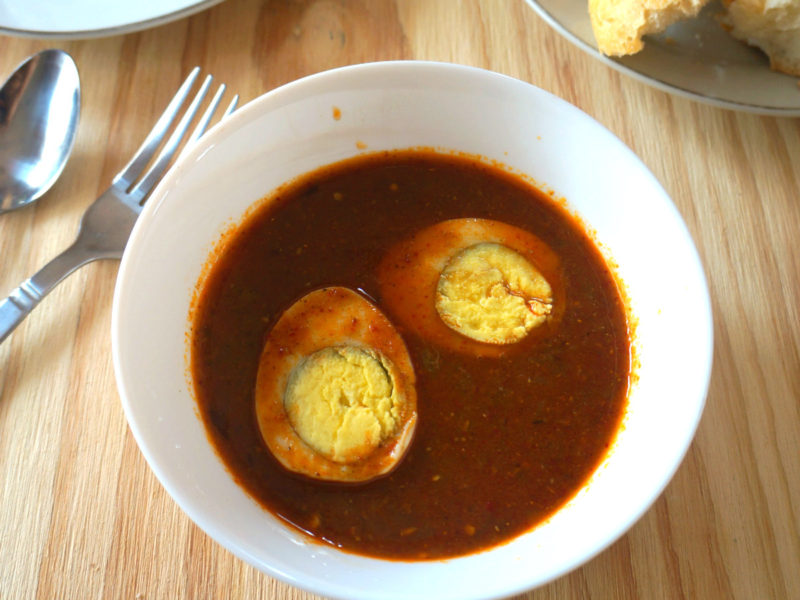 Egg Vindaloo in a White Bowl