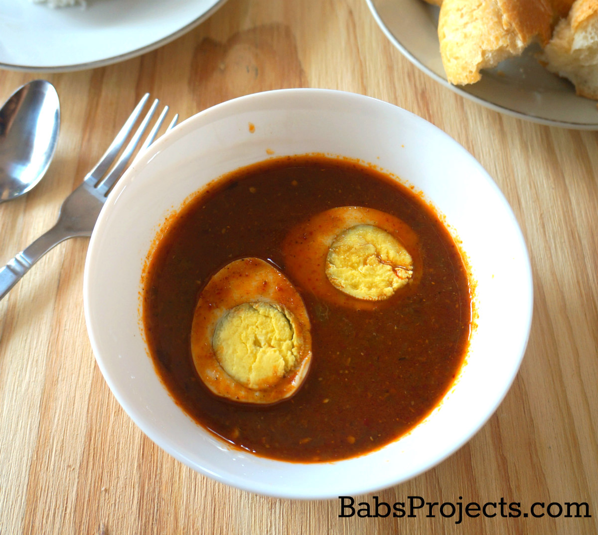 Egg Vindaloo in a White Bowl