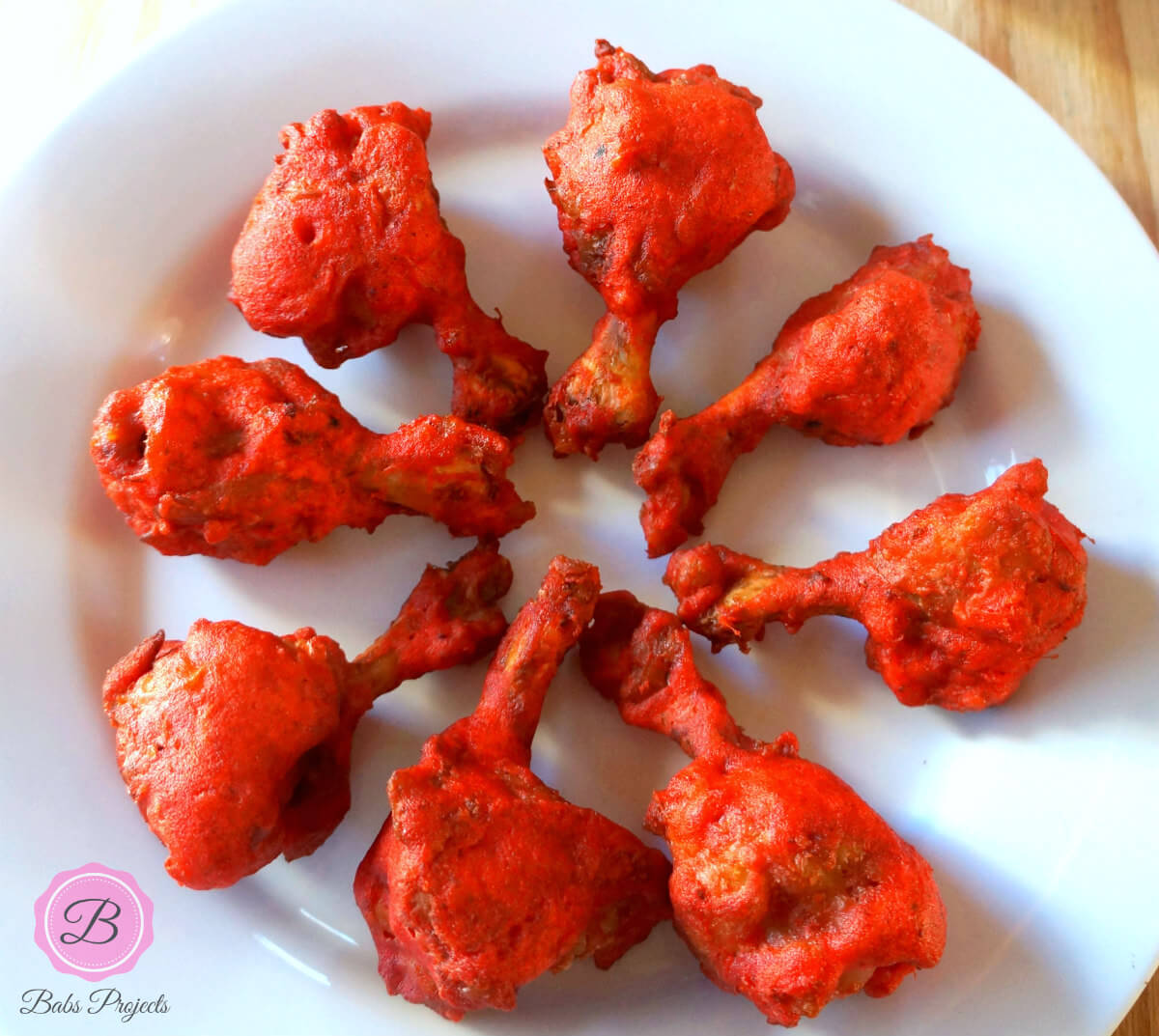 Chicken Lollipop on a White Plate