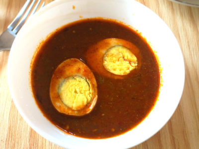 Egg Vindaloo in a White Bowl
