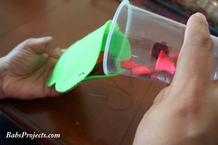 Potpourri Being Poured into the Green Pouches