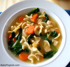 Enchance this Progresso Chicken Noodle Soup with Some Fresh Spinach and Rice Cake Noodles