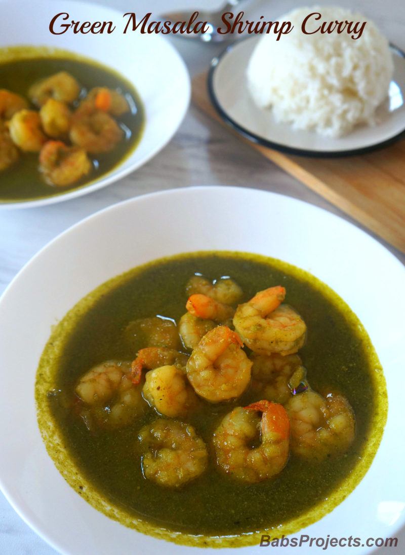 Green Masala Shrimp Curry in a White Bowl and Rice on the Side