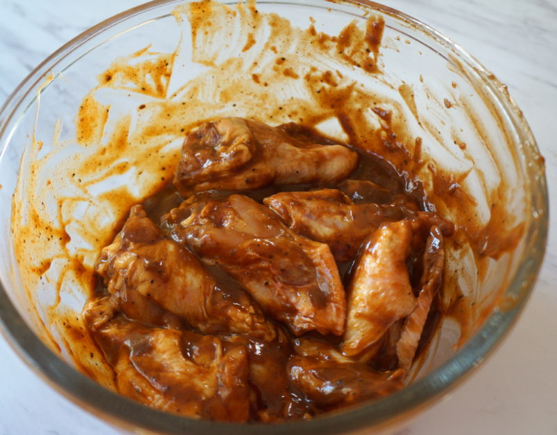 Baked Jerk Barbeque Chicken Wings Marinade in a Glass Bowl