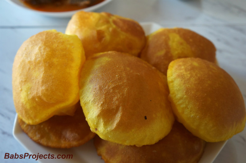 Ballooned up Rice Vade on a white Plate