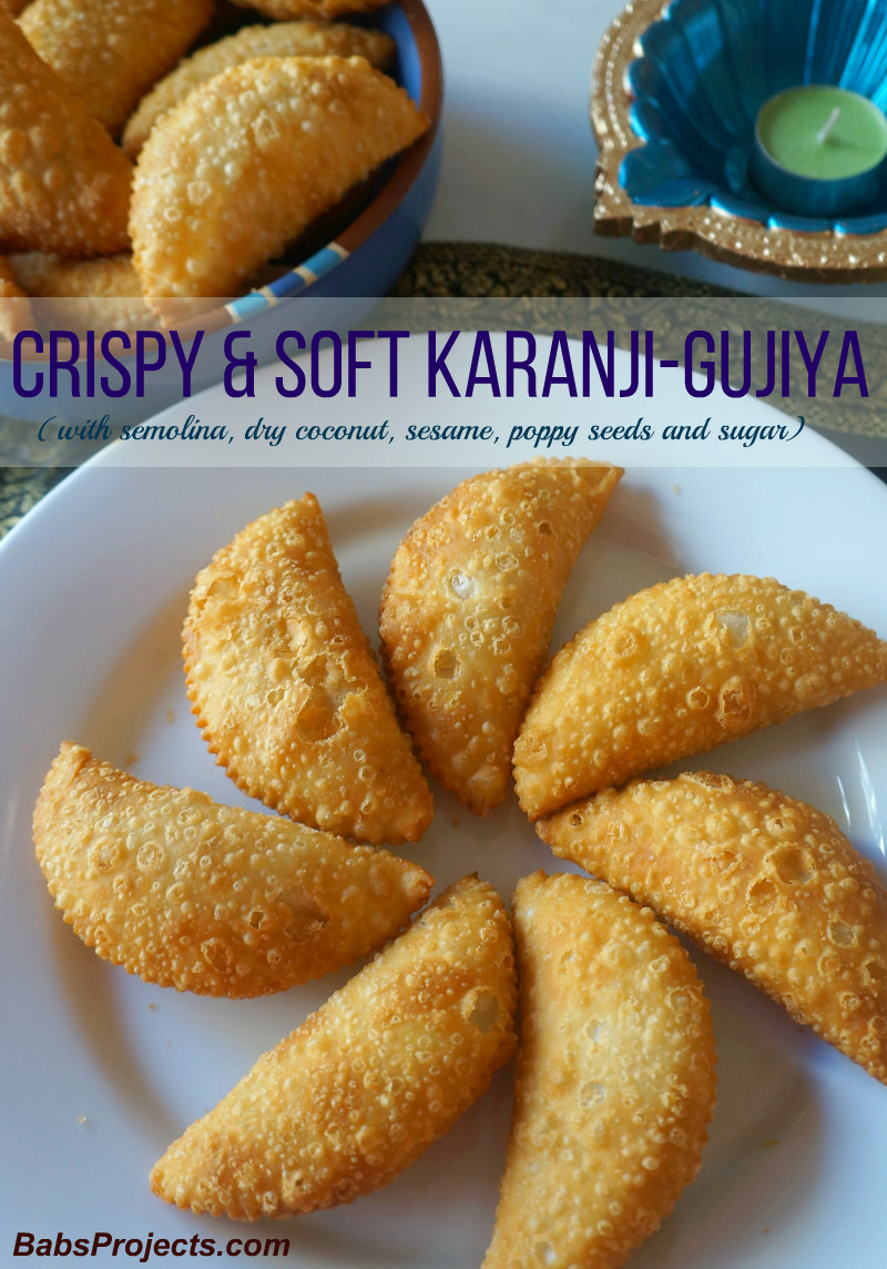 Karanji-Gujiya Placed on a Round White Plate with Blue Diya in the Corner