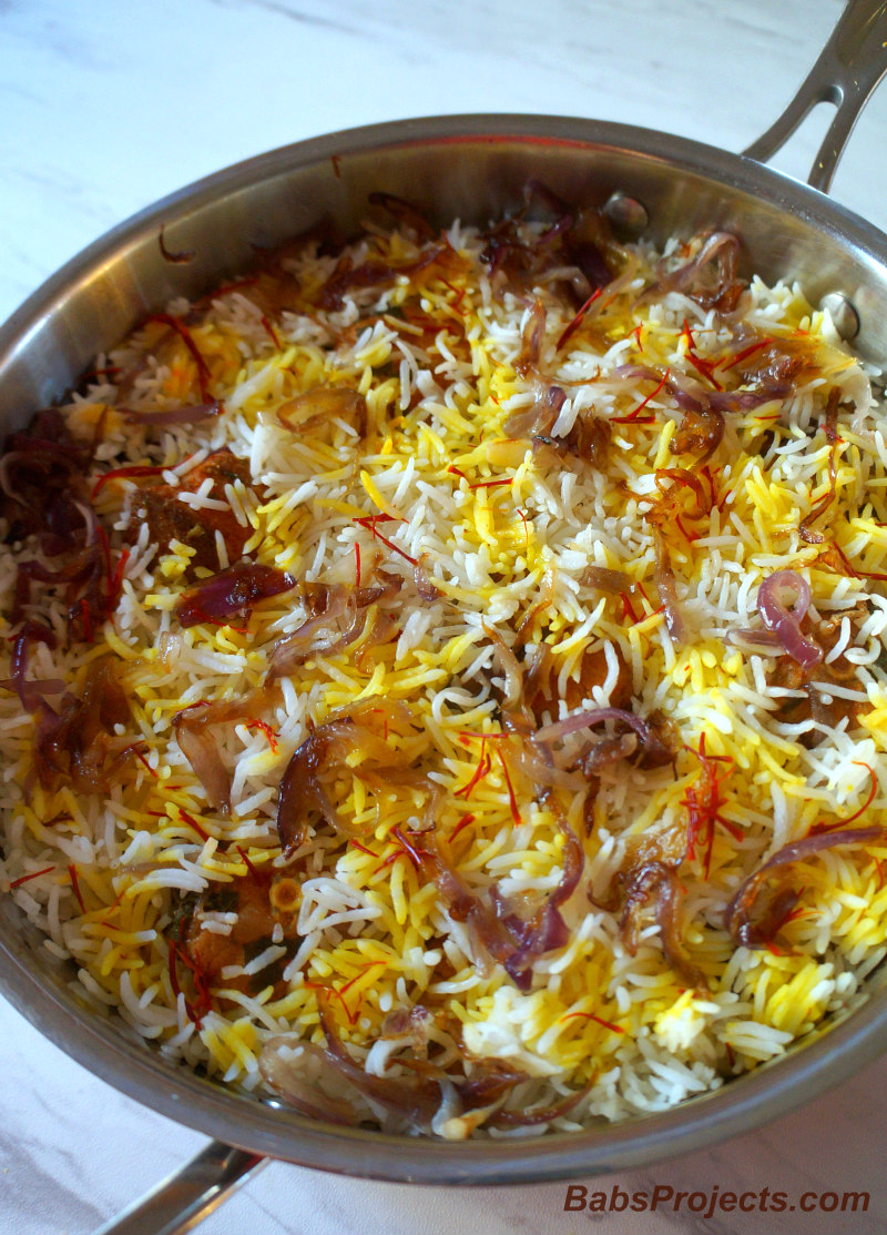 Yellow and White Rice with Saffron, Onion in a Pan