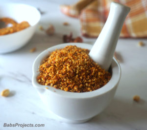 Dry Peanut Chutney in White Mortar and Pestle