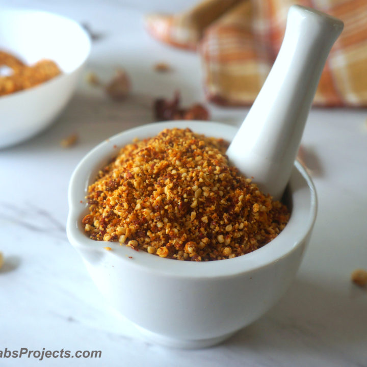Dry Peanut Chutney in White Mortar and Pestle