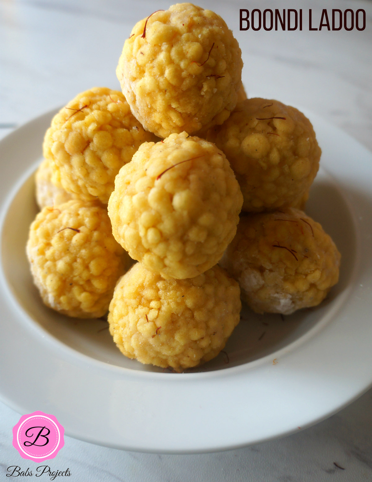 Yellow Boondi Ladoo on a White Bowl