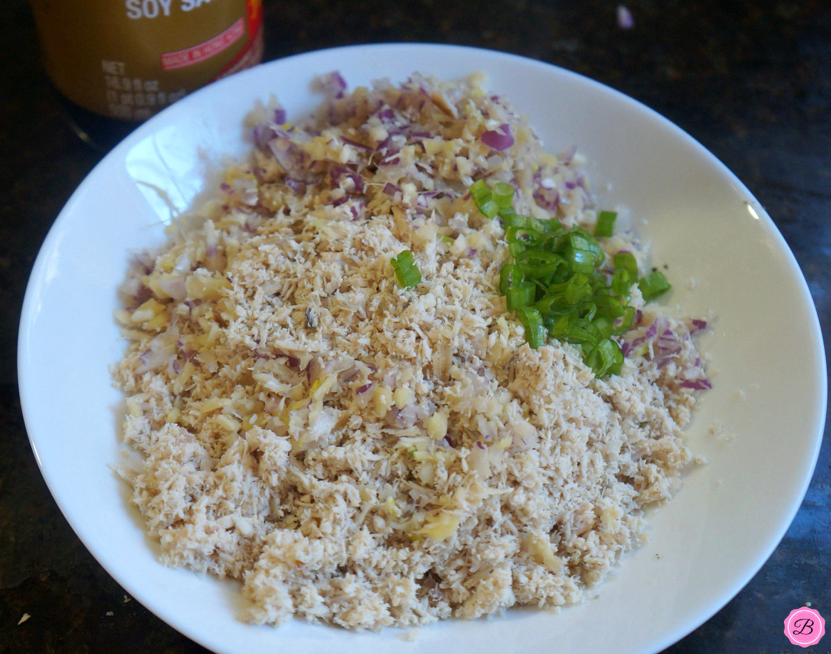 Cooked Chopped Turkey with Onions in a White Bowl