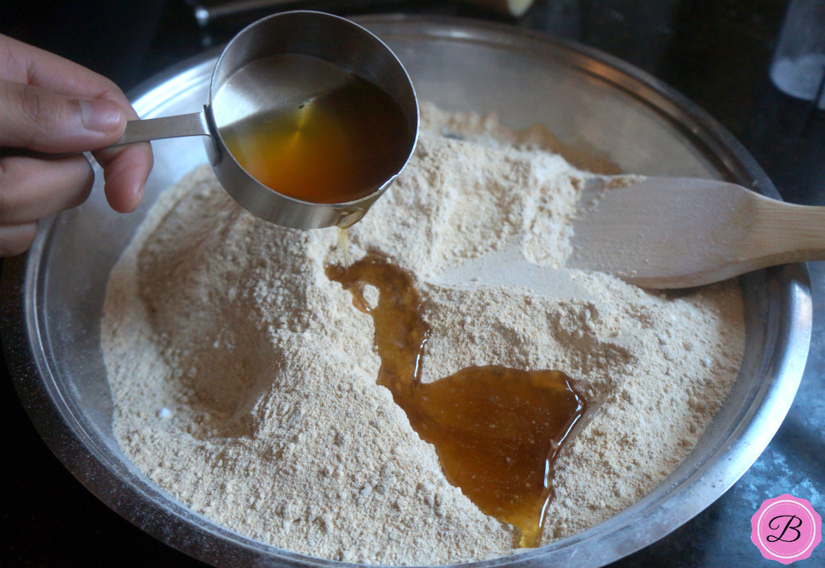 Adding Ghee to the Besan Mixture