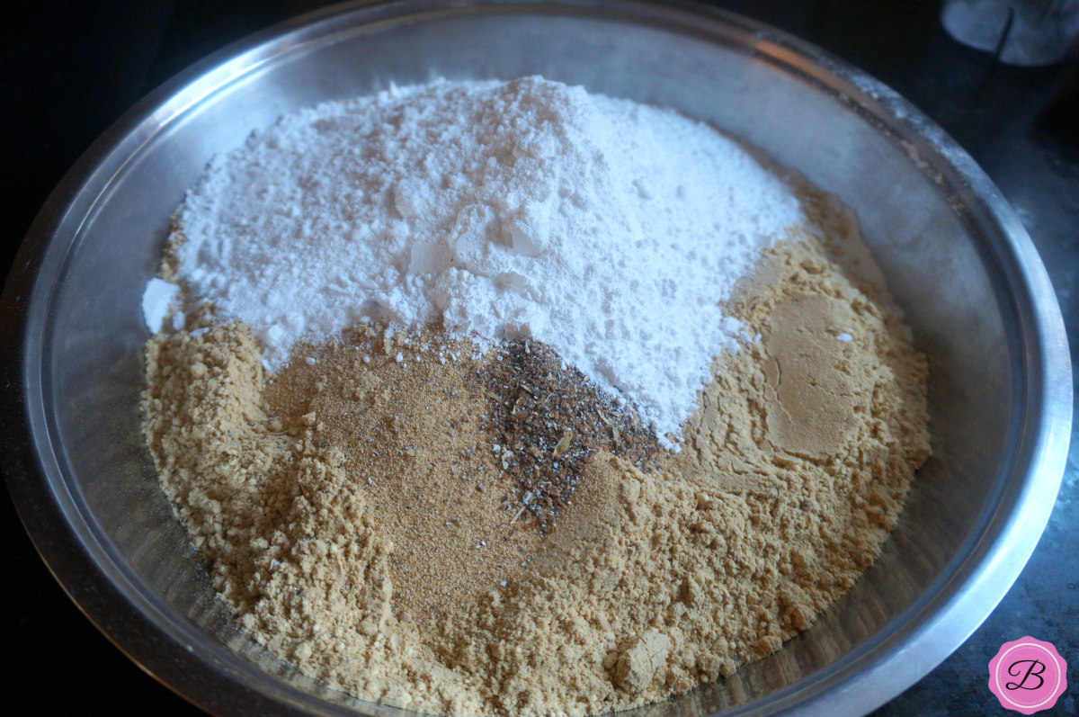 Ingredients for Besan Ladoo on a Stainless Steel Plate