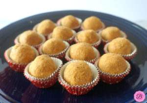 Besan Ladoo on a Blue Plate