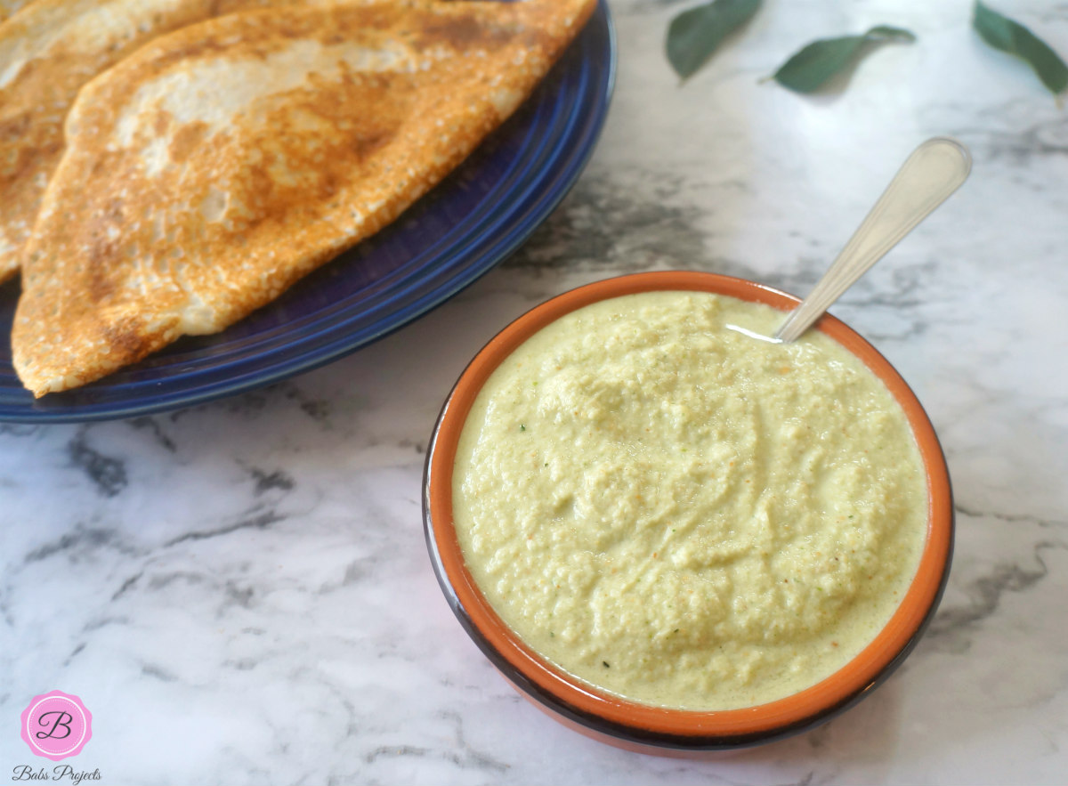 coconut chutney in a bowl served with dosa