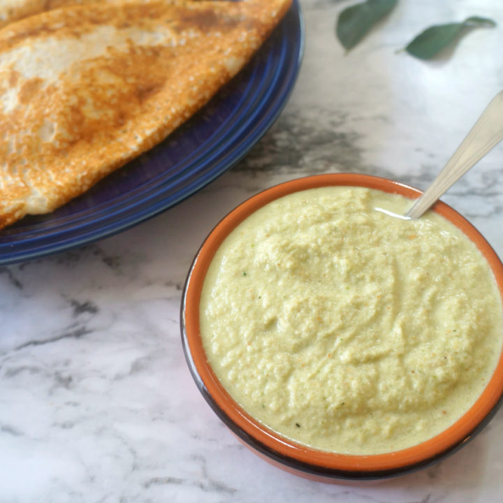 Coconut Chutney in a Bowl with Dosa on the Side