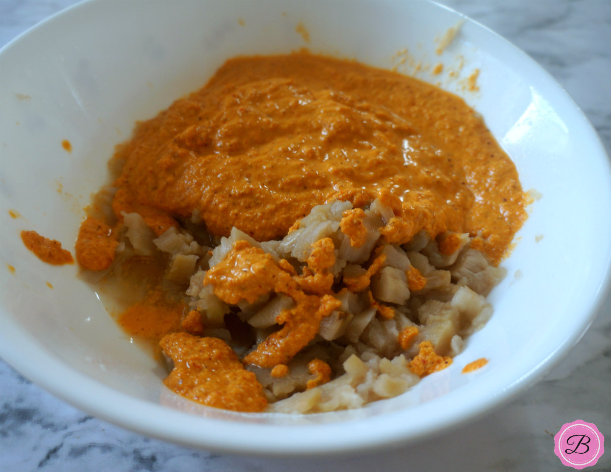 Ground Coconut Paste over Jackfruit Rinds in a White Bowl