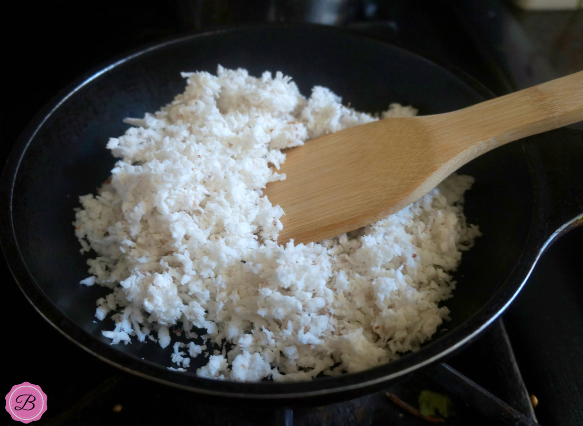 Roasting Coconut in a Pan with a Spatula