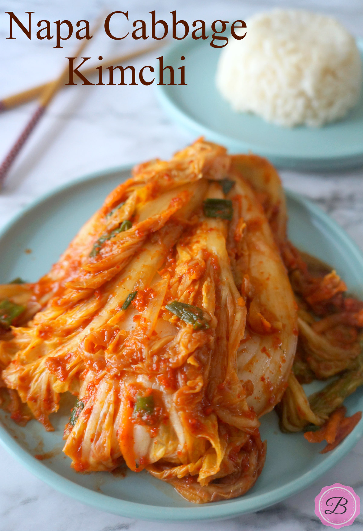 Napa Cabbage Kimchi on a Blue Plate Served with Rice on the Side