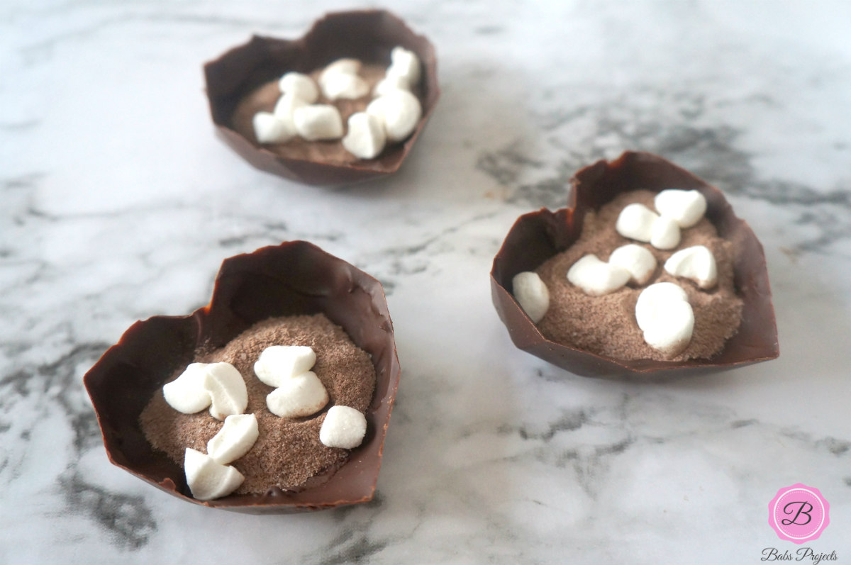 Hot Cocoa Powder and Marshmallows in the Heart Molds