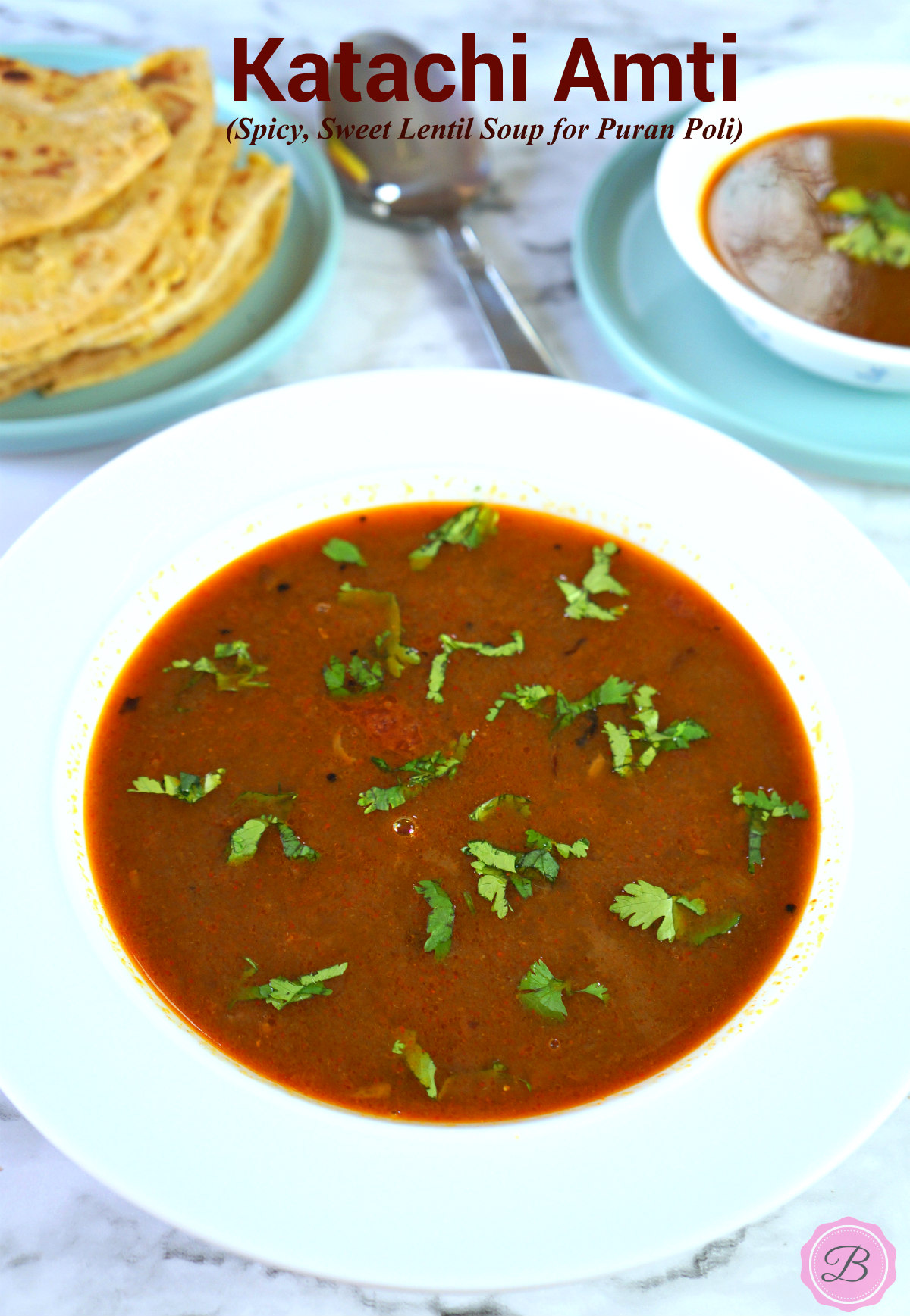 Katachi Amti in a White Bowl with Puran Poli on the Side