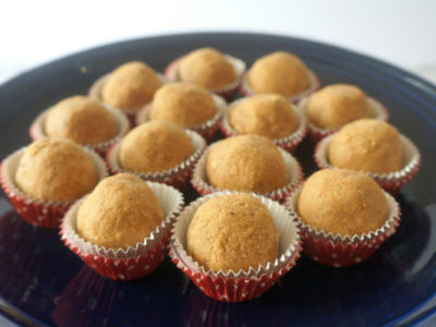 Besan Ladoo on a Blue Platter