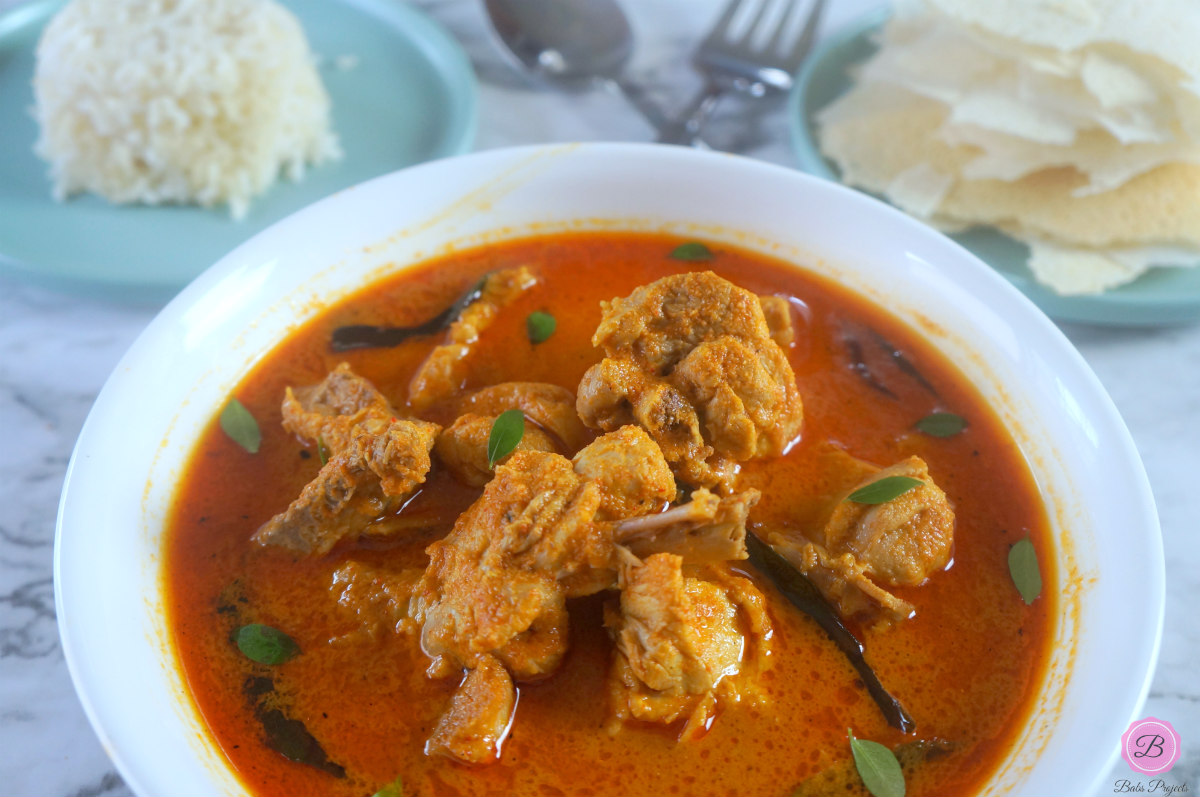 Kori Ghassi in a White Bowl with Rice on the Side