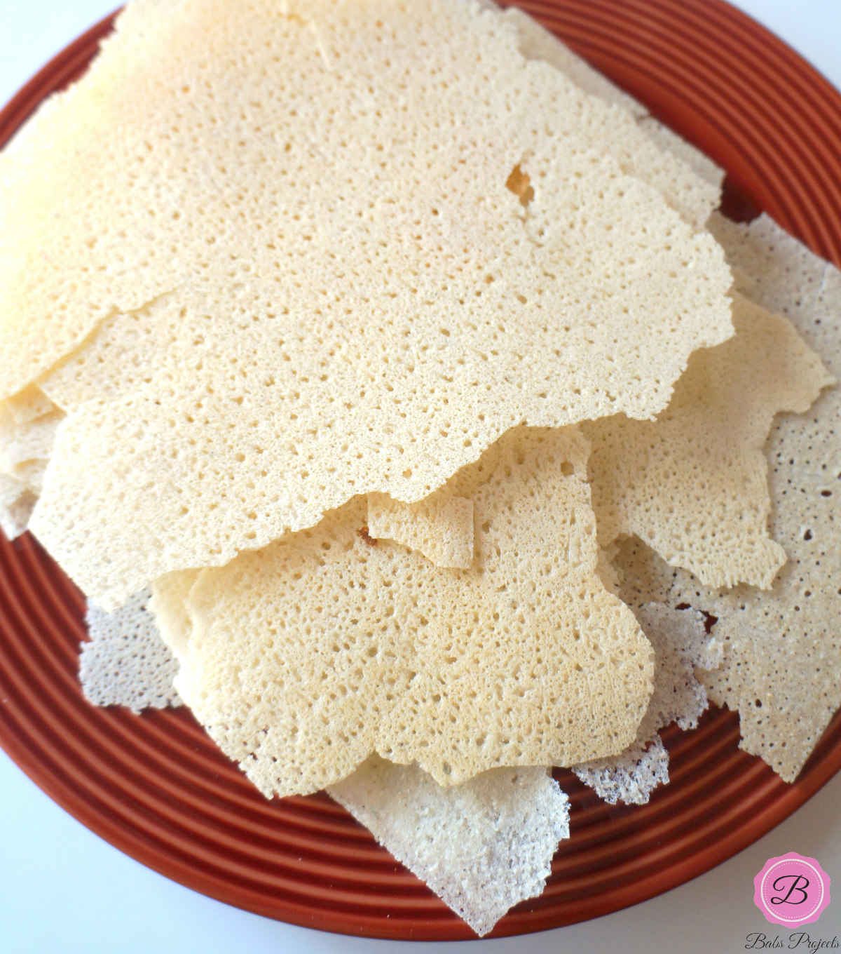 Rotti - Rice Crisps on a Red Plate