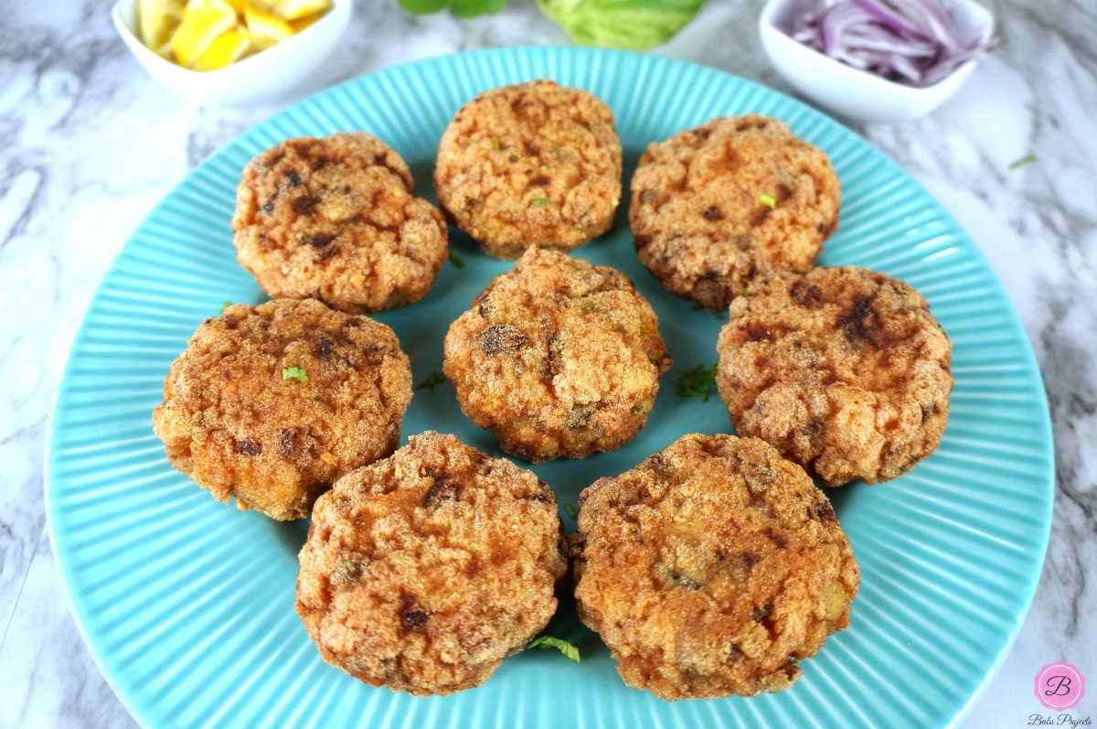 Goan Shrimp Cutlets Arranged in a Circle on a Blue Plate