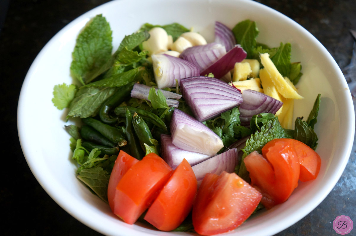 All Ingredients to Make Green Masala Paste in a White Bowl