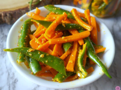 Carrot Green Chili Pickle in a White Bowl