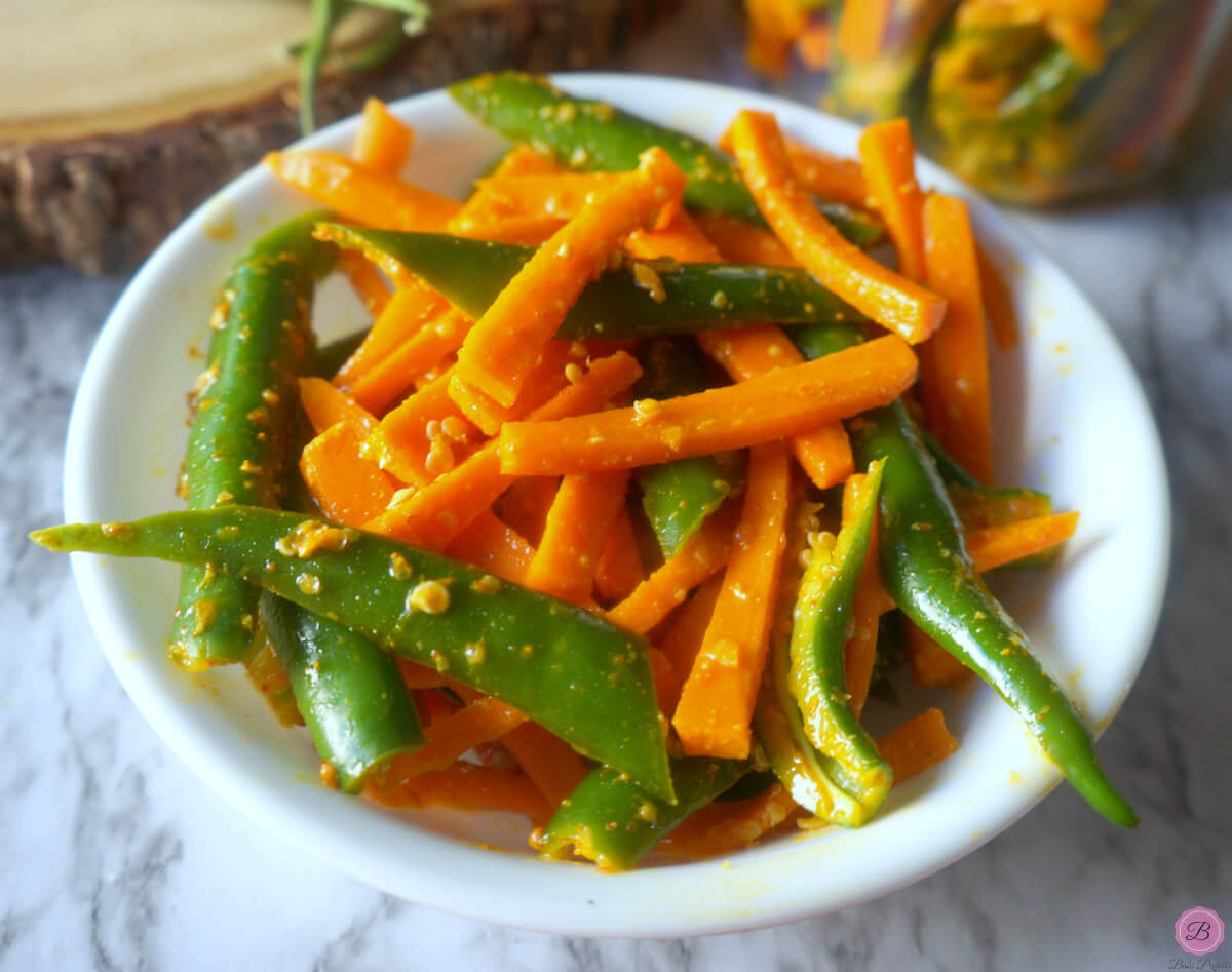 Carrot Green Chili Pickle in a White Bowl