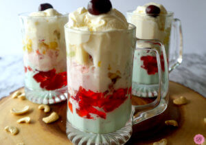 Three Tall Glasses of Gadbad Ice Cream with Cherry on Top