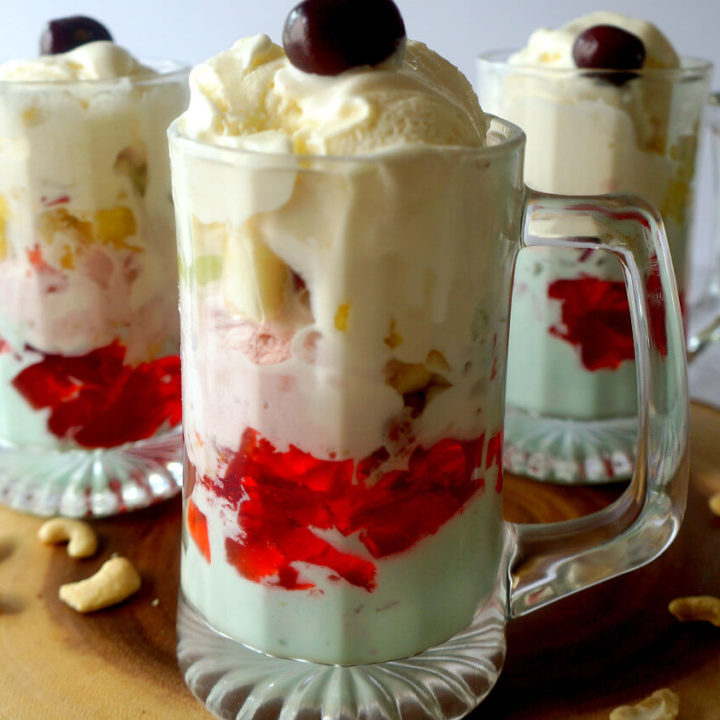 Three Tall Glasses of Gadbad Ice Cream with Cherry on Top