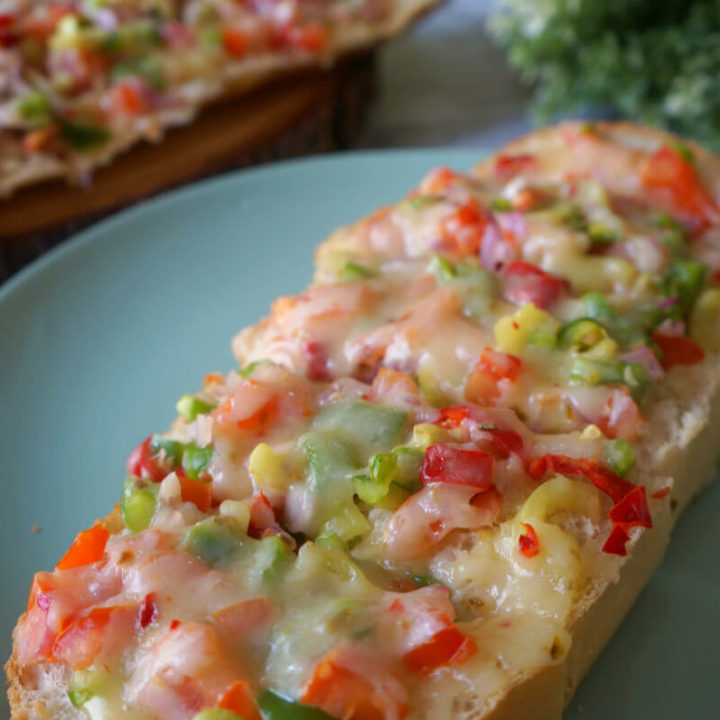 Slices of Bread Pizza on a Blue Plate