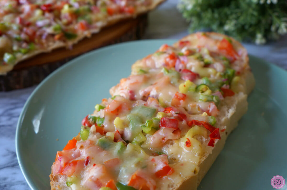 Slices of Bread Pizza on a Blue Plate