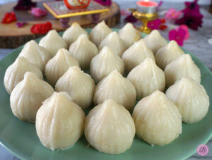 Steamed Rice Modak on a Blue Plate