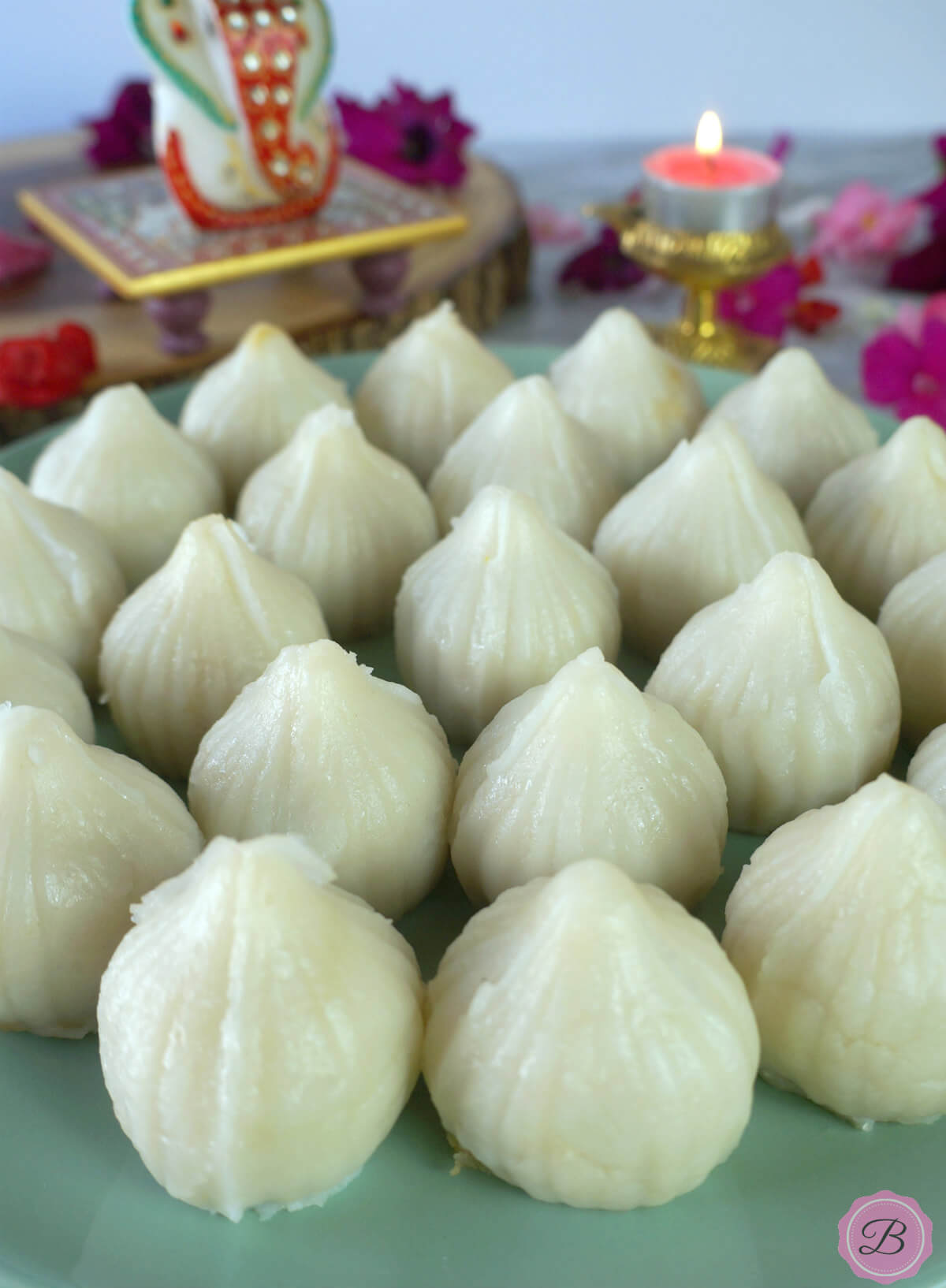 Steamed Rice Modak in a Blue Plate