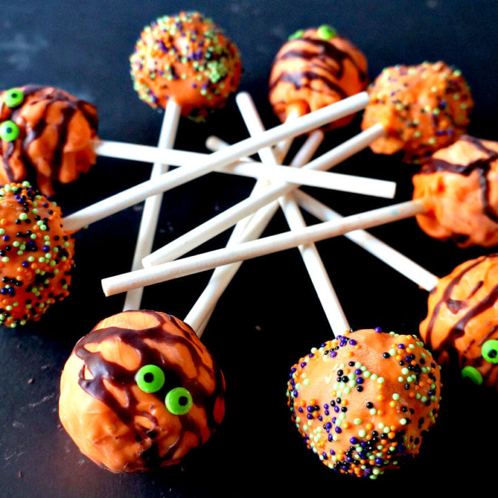 Orange Halloween Pops Decorated with Different Sprinkles