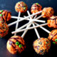 Orange Halloween Pops Decorated with Different Sprinkles
