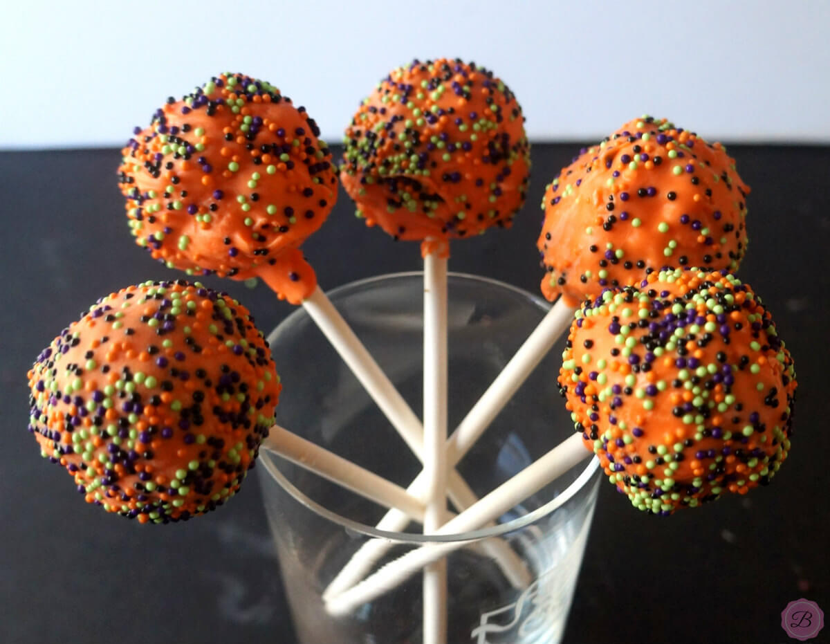 Rice Krispie Halloween Pops with Orange and Green Sprinkles