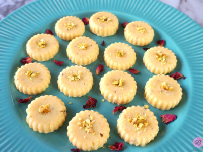 Close Up Shot of Milk Peda on a Blue Platter