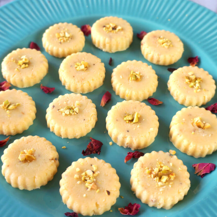 Close Up Shot of Milk Peda on a Blue Platter