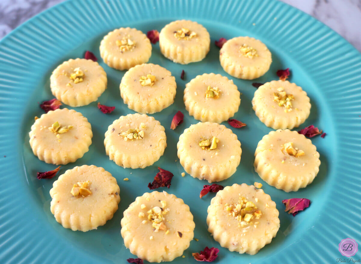 Close Up Shot of Milk Peda on a Blue Platter