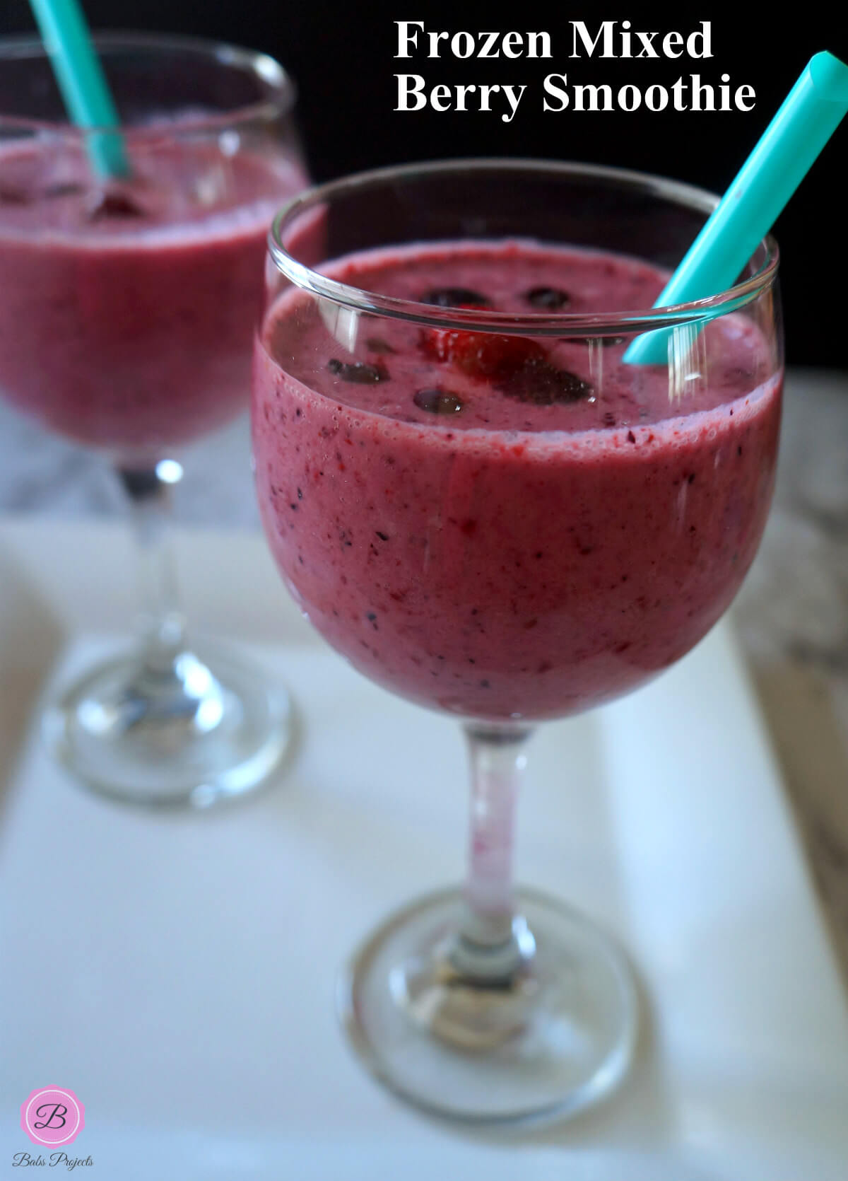 Mixed Berries Smoothies Served in Wine Glasses