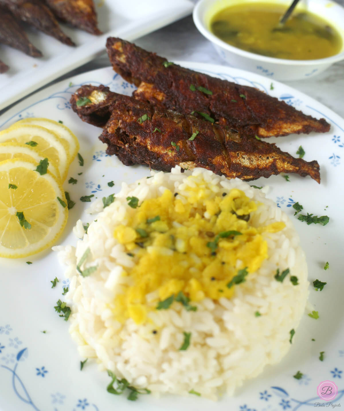 Rice and Daal with Bangude Fry on the Side