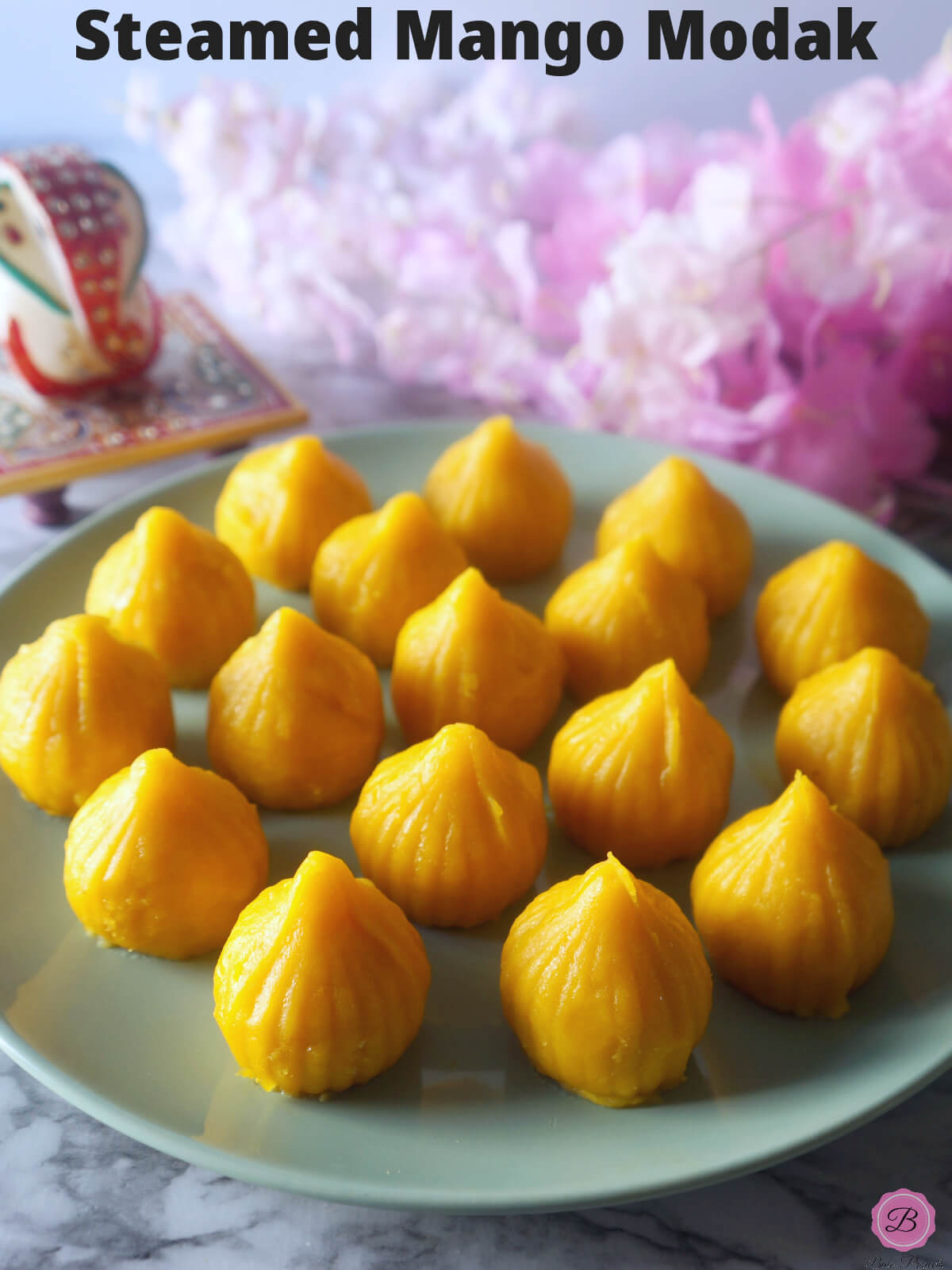 Steamed Mango Modak on a Plate